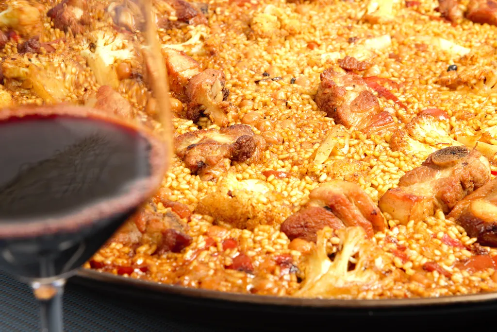 Paella costillas coliflor y garbanzos